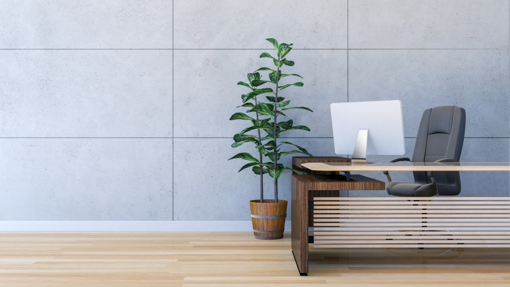 Bright, clean office environment with natural light, green plants, and happy employees working productively.